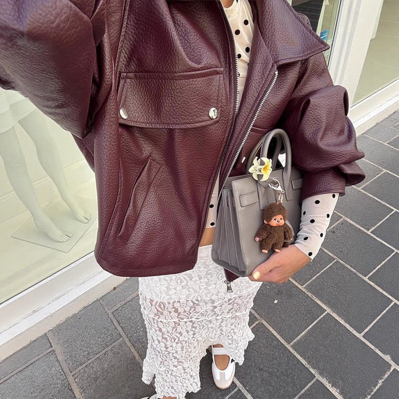 Kurzjacke aus Kunstleder mit Volumenärmeln für Damen