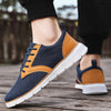 Herren-Sneaker aus Mesh mit Lederakzenten und Gummisohle