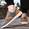 Herren-Sneaker aus Mesh mit Lederakzenten und Gummisohle