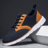 Herren-Sneaker aus Mesh mit Lederakzenten und Gummisohle