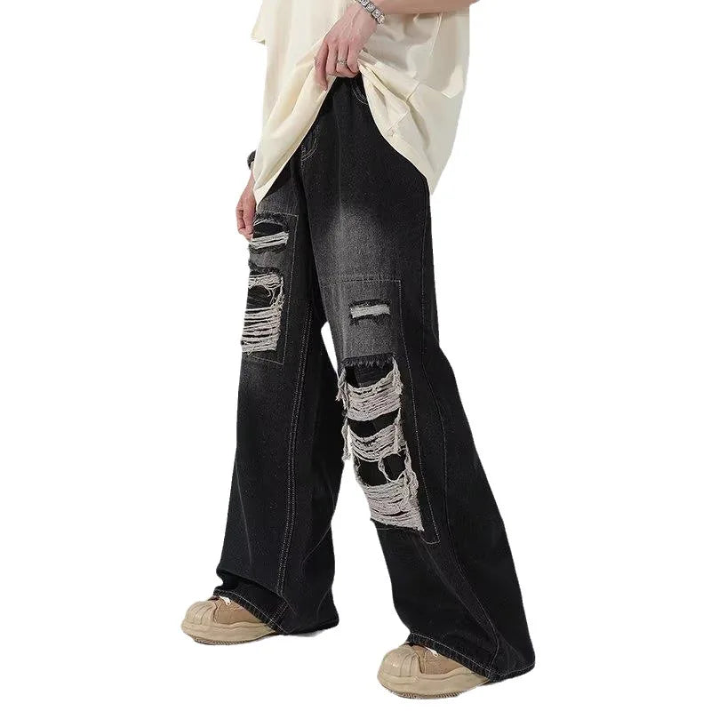 Herren-Jeans aus schwarzem Denim mit weitem Bein und Used-Look