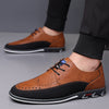 Herren-Lederschuhe mit Brogue-Verzierung und Gummisohle