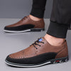 Herren-Lederschuhe mit Brogue-Verzierung und Gummisohle