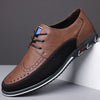 Herren-Lederschuhe mit Brogue-Verzierung und Gummisohle