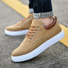 Herren-Sneaker aus Canvas mit niedriger Sohle, Gummisohle und Schnürsenkeln