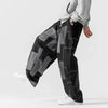 Herren-Patchwork-Jeans mit lockerer Passform und Kordelzug in der Taille