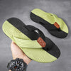 Herren-Sommer-Flip-Flops mit geflochtenen Riemen und Fußbett