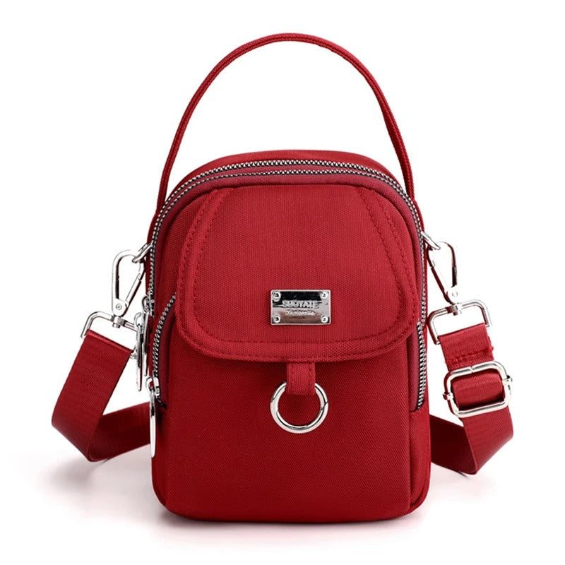 Carry - Kleine Crossbody-Tasche